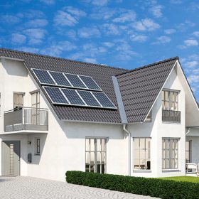 updated white house with large roof and solar installed, EcoShield Exteriors - Highlands Ranch and Littleton Roofing Professionals