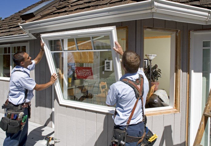 Installing window - Littleton - EcoShield Exteriors
