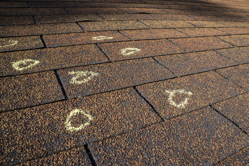 Chalk-Marked Hail Damage On A Roof